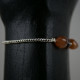 Bracelet avec perles noires de Tahiti et Comalines