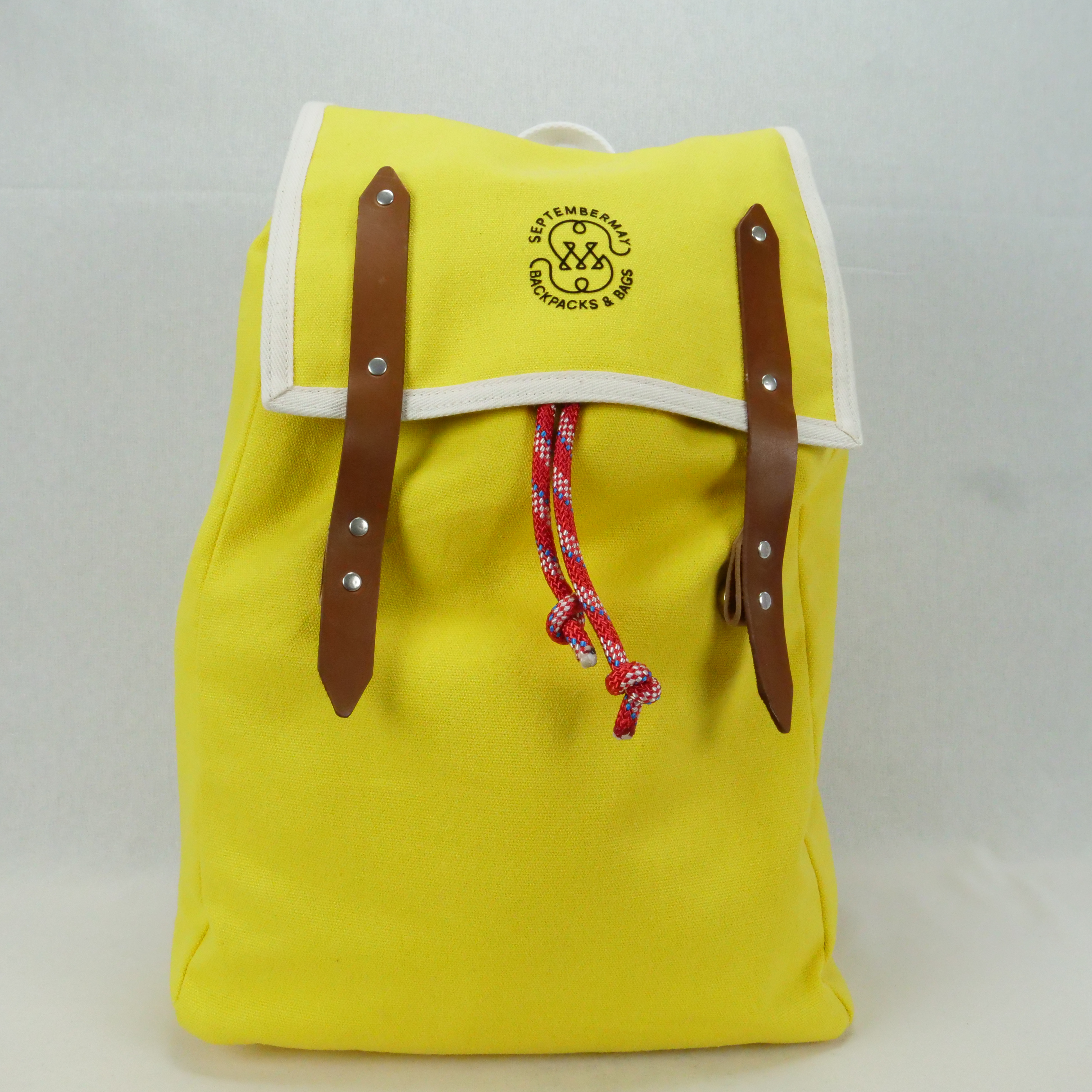 yellow canvas backpack