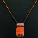 Long necklace with polymer pendant and wooden beads